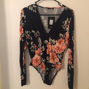 Sexy floral and navy bodysuit new with tags